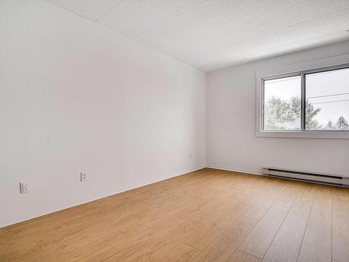 Chambre Ã Â coucher - 562-345 Boul. Jean-Baptiste-Rolland E., Saint-Jérôme, QC - Indoor Photo Showing Other Room