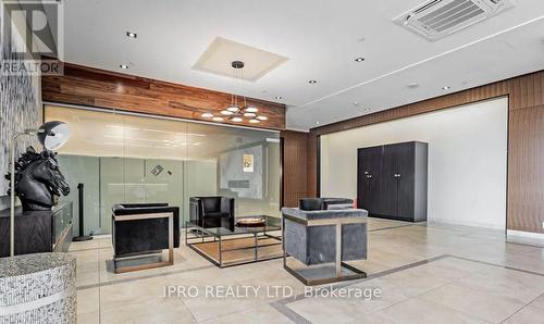 607 - 17 Zorra Street, Toronto, ON - Indoor Photo Showing Other Room With Fireplace