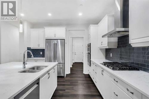 114 Lucas Terrace Nw, Calgary, AB - Indoor Photo Showing Kitchen With Stainless Steel Kitchen With Double Sink With Upgraded Kitchen