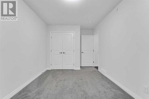 114 Lucas Terrace Nw, Calgary, AB - Indoor Photo Showing Other Room