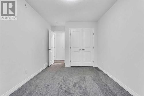 114 Lucas Terrace Nw, Calgary, AB - Indoor Photo Showing Other Room