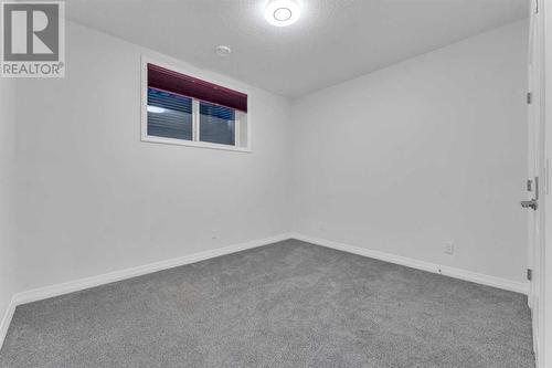 114 Lucas Terrace Nw, Calgary, AB - Indoor Photo Showing Other Room