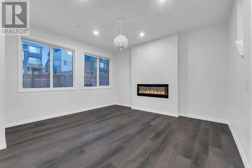 114 Lucas Terrace Nw, Calgary, AB - Indoor With Fireplace