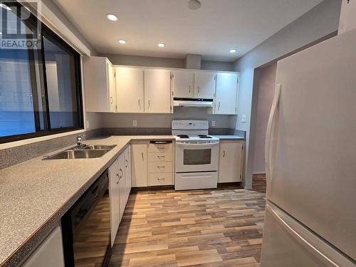 7717 Prairie Valley Road Unit# 103, Summerland, BC - Indoor Photo Showing Kitchen With Double Sink