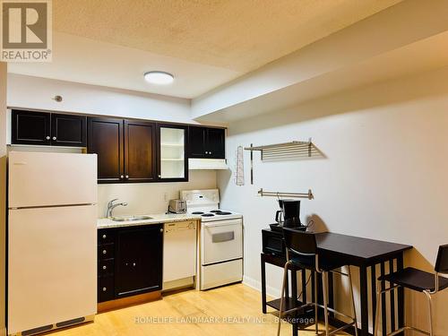 605 - 210 Victoria Street, Toronto, ON - Indoor Photo Showing Kitchen