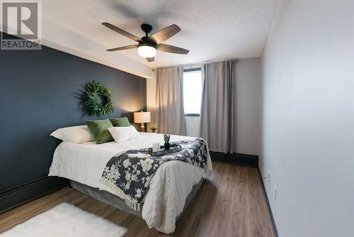 912, 4902 37 Street, Red Deer, AB - Indoor Photo Showing Bedroom