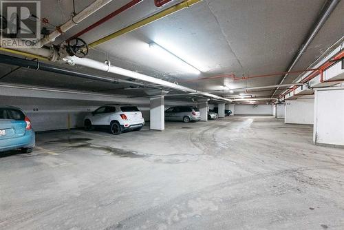 Parking is assigned - 912, 4902 37 Street, Red Deer, AB - Indoor Photo Showing Garage