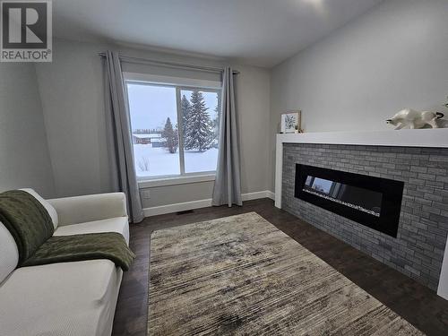 445 Reid Drive, Vanderhoof, BC - Indoor Photo Showing Living Room With Fireplace