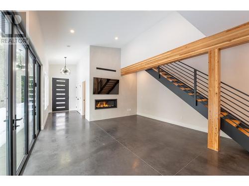 1350 Kai Road, Nelson, BC - Indoor Photo Showing Other Room With Fireplace