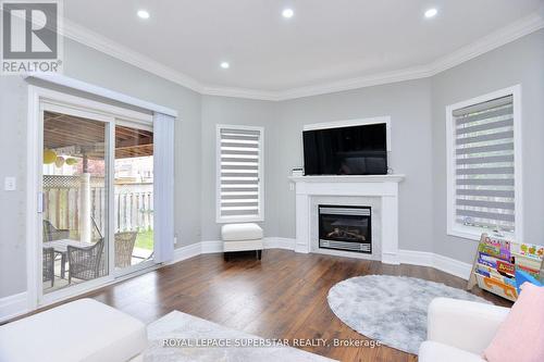 Upper - 12 El Camino Way, Brampton, ON - Indoor Photo Showing Living Room With Fireplace