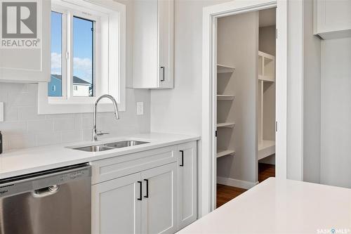 264 Oliver Lane, Martensville, SK - Indoor Photo Showing Kitchen With Double Sink