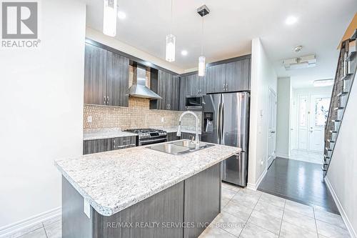 62 Hogan Manor Drive, Brampton, ON - Indoor Photo Showing Kitchen With Stainless Steel Kitchen With Double Sink With Upgraded Kitchen