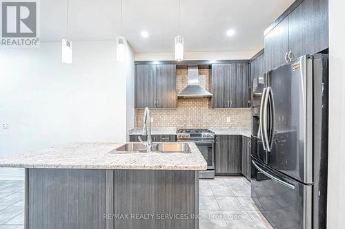 62 Hogan Manor Drive, Brampton, ON - Indoor Photo Showing Kitchen With Stainless Steel Kitchen With Double Sink With Upgraded Kitchen