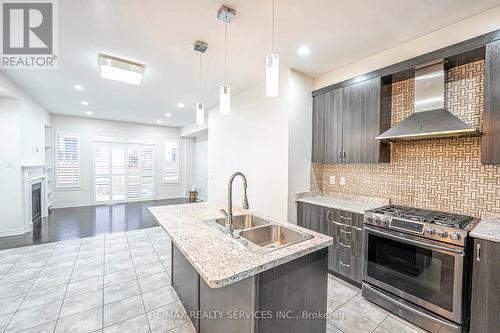 62 Hogan Manor Drive, Brampton, ON - Indoor Photo Showing Kitchen With Stainless Steel Kitchen With Double Sink With Upgraded Kitchen