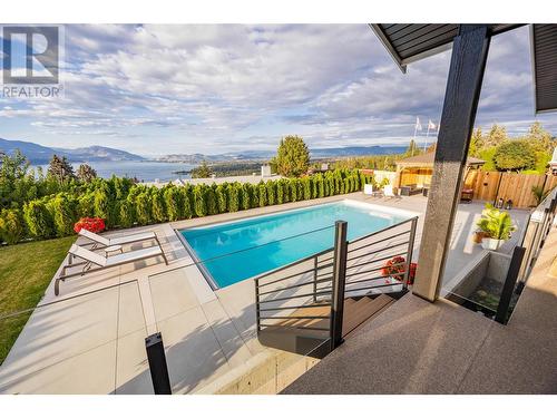 415 Curlew Drive, Kelowna, BC - Outdoor With In Ground Pool With Deck Patio Veranda With View