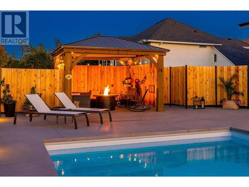 415 Curlew Drive, Kelowna, BC - Outdoor With In Ground Pool With Deck Patio Veranda