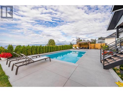 415 Curlew Drive, Kelowna, BC - Outdoor With In Ground Pool