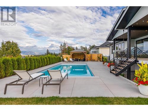 415 Curlew Drive, Kelowna, BC - Outdoor With In Ground Pool