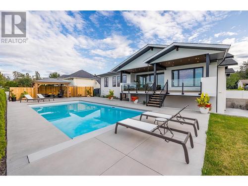 415 Curlew Drive, Kelowna, BC - Outdoor With In Ground Pool With Deck Patio Veranda