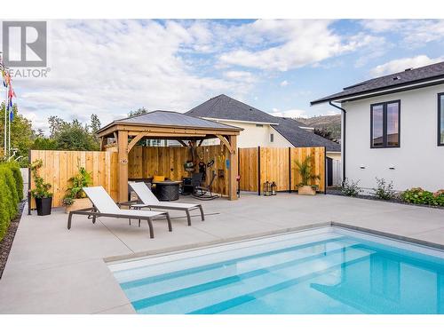 415 Curlew Drive, Kelowna, BC - Outdoor With In Ground Pool