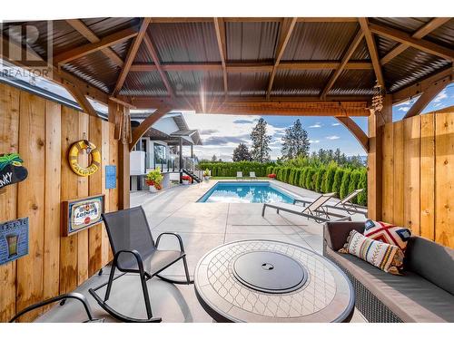 415 Curlew Drive, Kelowna, BC - Indoor Photo Showing Other Room With In Ground Pool