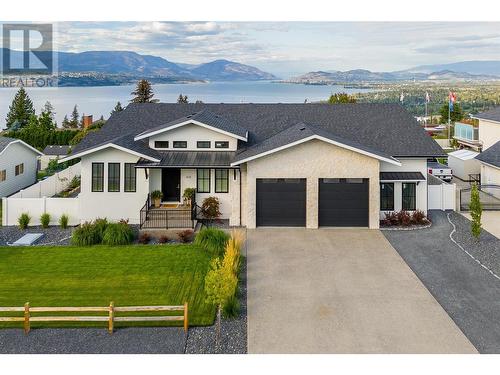 415 Curlew Drive, Kelowna, BC - Outdoor With Body Of Water With Facade