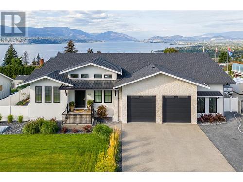 415 Curlew Drive, Kelowna, BC - Outdoor With Body Of Water With Facade