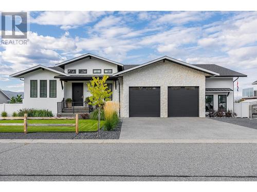 415 Curlew Drive, Kelowna, BC - Outdoor With Facade