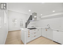 Stair railing, dishwasher, range hood and fridge are photoshopped in. Waiting on appliance to arrive. - 