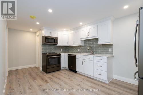 Bsmt - 20 Ottaway Avenue, Barrie, ON - Indoor Photo Showing Kitchen With Upgraded Kitchen