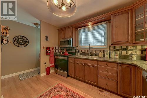 1122 Warner Street W, Moose Jaw, SK - Indoor Photo Showing Kitchen With Double Sink