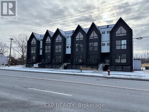 104 - 7277 Wilson Crescent, Niagara Falls, ON - Outdoor With Facade