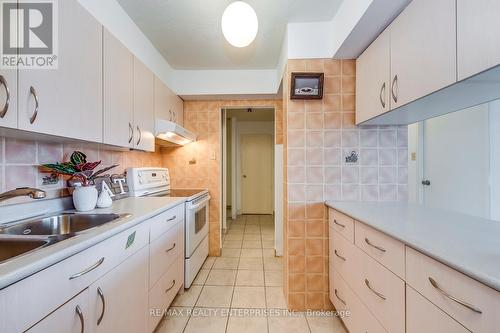 301 - 40 Bay Mills Boulevard, Toronto, ON - Indoor Photo Showing Kitchen With Double Sink