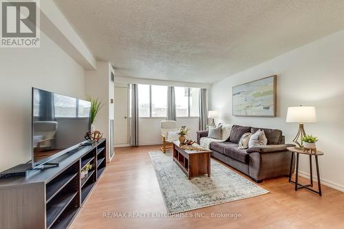 301 - 40 Bay Mills Boulevard, Toronto, ON - Indoor Photo Showing Living Room