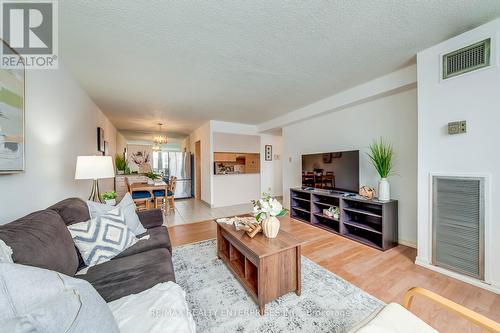 301 - 40 Bay Mills Boulevard, Toronto, ON - Indoor Photo Showing Living Room