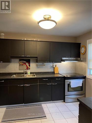 710 Wonderland Road S, London, ON - Indoor Photo Showing Kitchen With Double Sink