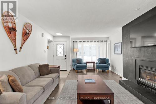 159 Vacation Inn Drive, Collingwood, ON - Indoor Photo Showing Living Room With Fireplace