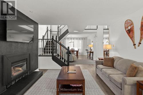 159 Vacation Inn Drive, Collingwood, ON - Indoor Photo Showing Living Room With Fireplace