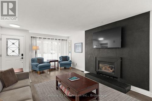 159 Vacation Inn Drive, Collingwood, ON - Indoor Photo Showing Living Room With Fireplace