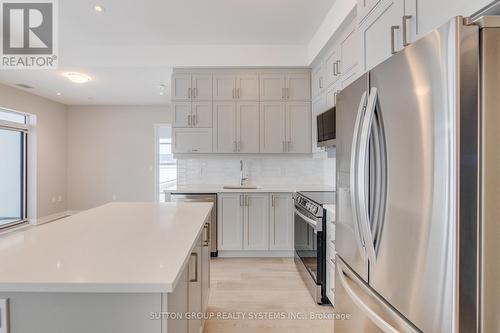 608 - 480 Gordon Krantz Avenue, Milton, ON - Indoor Photo Showing Kitchen With Stainless Steel Kitchen With Upgraded Kitchen