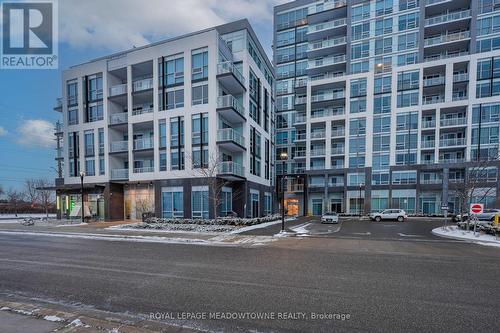 809 - 1050 Main Street E, Milton, ON - Outdoor With Balcony With Facade