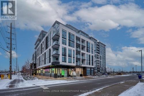 809 - 1050 Main Street E, Milton, ON - Outdoor With Balcony With Facade