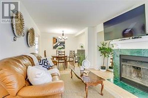 2564 Addingham Crescent, Oakville, ON - Indoor Photo Showing Living Room With Fireplace