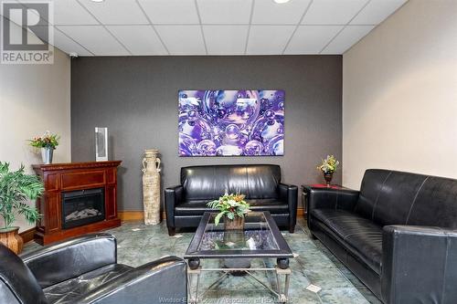 540 Ouellette Avenue Unit# 3E, Windsor, ON - Indoor Photo Showing Living Room With Fireplace