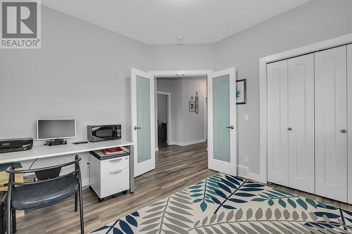 3rd Bedroom/corner windows and closet. Den and /or office - 3400 Kingfisher Road, West Kelowna, BC - Indoor Photo Showing Office