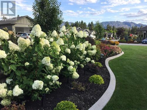 Seasonal Summer Perennial Flowers on the front yard  property - 3400 Kingfisher Road, West Kelowna, BC - Outdoor