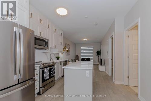 203 - 460 Gordon Krantz Avenue, Milton, ON - Indoor Photo Showing Kitchen With Stainless Steel Kitchen