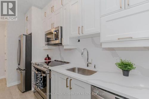 203 - 460 Gordon Krantz Avenue, Milton, ON - Indoor Photo Showing Kitchen With Stainless Steel Kitchen