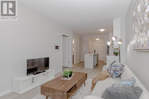 203 - 460 Gordon Krantz Avenue, Milton, ON - Indoor Photo Showing Living Room