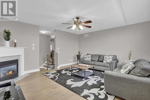 8 Meadow Wood Crescent, Hamilton, ON - Indoor Photo Showing Living Room With Fireplace